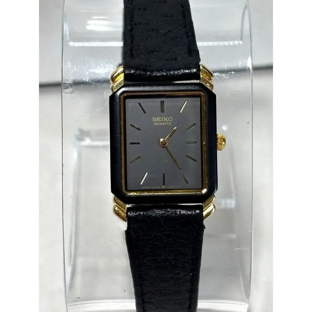 Vintage Seiko 2P20-5000 gold tone women's watch with black leather, working